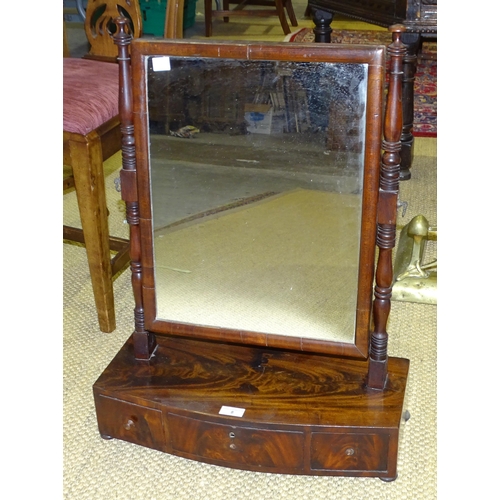 8 - A Georgian mahogany bow-fronted dressing table mirror fitted with three drawers and rectangular mirr... 