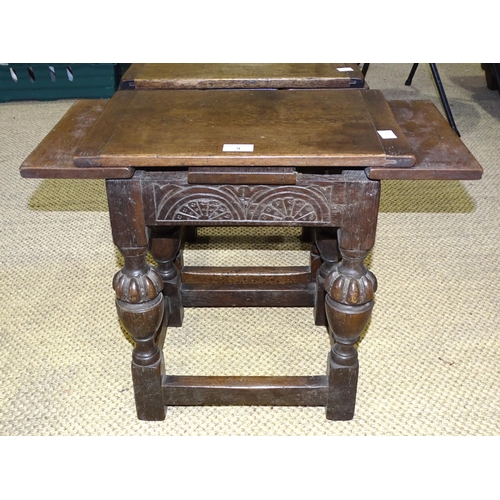 9 - Two 'antique' oak joint stool/side tables, each with unusual pull-out top, on carved cup and cover s... 