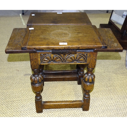 9 - Two 'antique' oak joint stool/side tables, each with unusual pull-out top, on carved cup and cover s... 