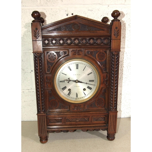 53 - B W Nix, Exeter, a late-19th/early-20th century walnut bracket clock in the Aesthetic taste, with tw... 