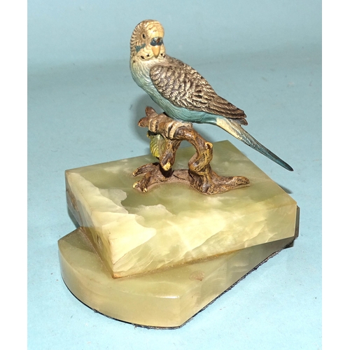 101 - A cold-painted bronze figure of a budgerigar perched on a branch, 8.5cm high, mounted on a double on... 