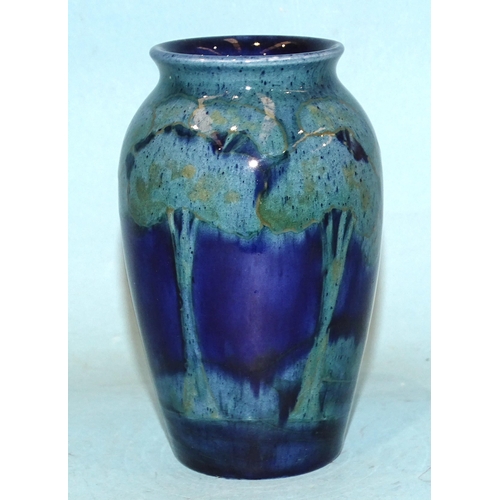 109 - A William Moorcroft 'Moonlit Blue' small baluster vase, with painted initials and impressed 'Made in... 