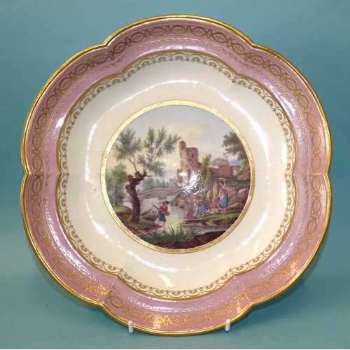 115 - A 19th century large 'Sevres' dish, later decorated in England with figures by a river, with a pink ... 