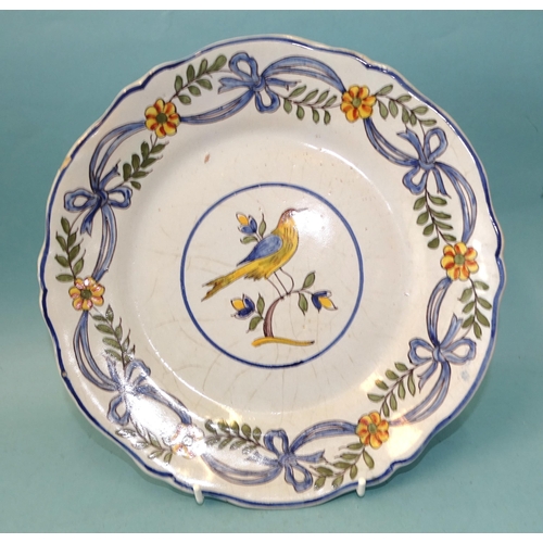 124 - Four 19th century French Faience plates, probably Rouen, (one marked), 24cm diameter.... 