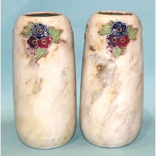 125 - Masonic interest, a pair of Royal Doulton vases with tubelined floral decoration, impressed factory ... 