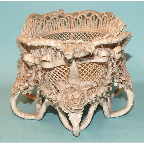 128 - A Belleek Rathmore pearlescent finish basket, elaborately encrusted and decorated with flowers and f... 