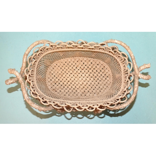 128 - A Belleek Rathmore pearlescent finish basket, elaborately encrusted and decorated with flowers and f... 