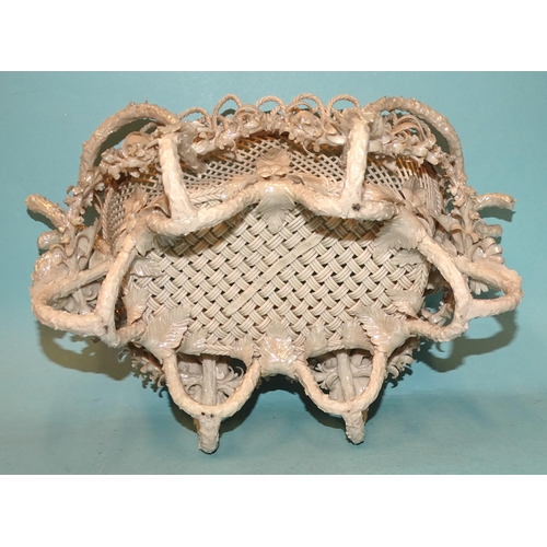 128 - A Belleek Rathmore pearlescent finish basket, elaborately encrusted and decorated with flowers and f... 