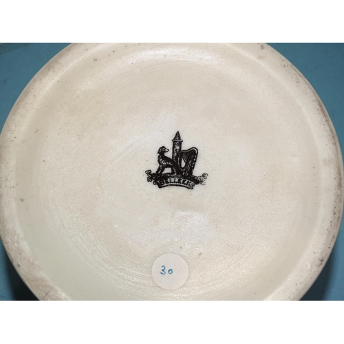 131 - A Belleek strap-moulded tazza, the dish with central armorial and motto Metuenda Corolla Draconis, 2... 