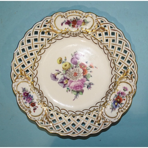 138 - A set of four 19th century Meissen porcelain pierced plates painted with flower sprays and gilded th... 