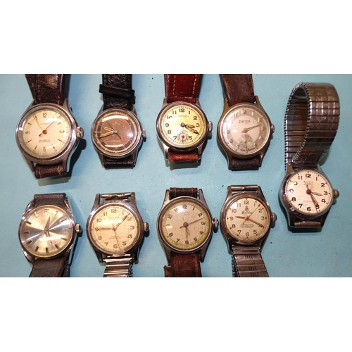 297 - A Tourist automatic wrist watch, (starts and runs) and eight other vintage steel-cased wrist watches... 