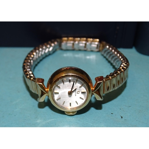 307 - Omega, a lady's gold-plated vintage wrist watch, a Philip Mercer two-watch set, (boxed) and two Oska... 