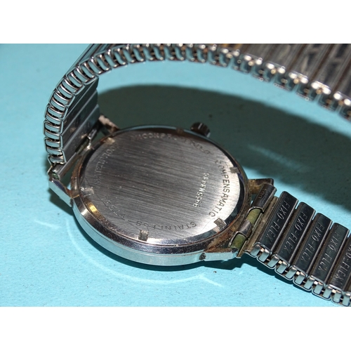 313 - J W Benson, a gentleman's steel-cased wrist watch, 33mm, the silvered dial with Arabic 3, 6, 9 and 1... 