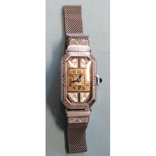 317 - A Benrus Art-Deco-style wrist watch, the square gilt face between floral enamelled panels, in white-... 