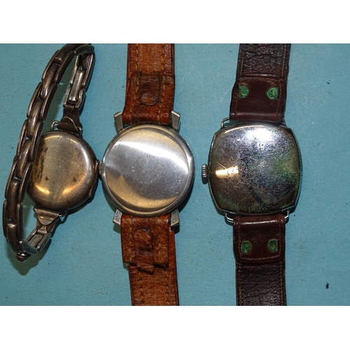 319 - An early-20th century lady's silver cased wristwatch, the case and movement marked Rolex, a gent's R... 