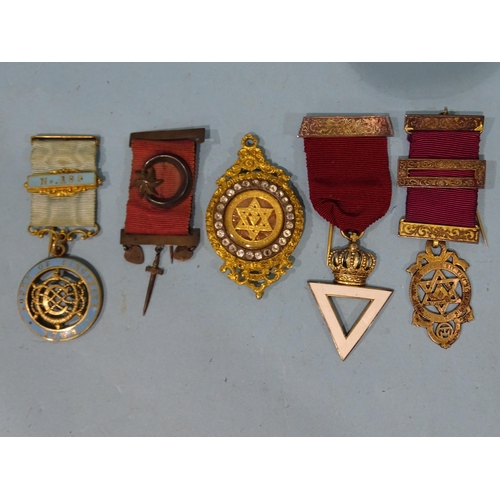 334 - A collection of silver-gilt enamel and base metal Masonic jewels and other Masonic items.... 