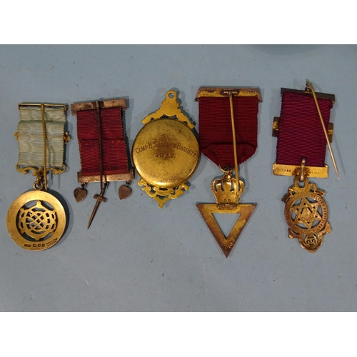 334 - A collection of silver-gilt enamel and base metal Masonic jewels and other Masonic items.... 