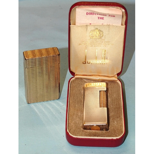 353 - A Dunhill Rollagas lighter, engine-turned, with gold-plated lid, (worn), boxed with instructions and... 