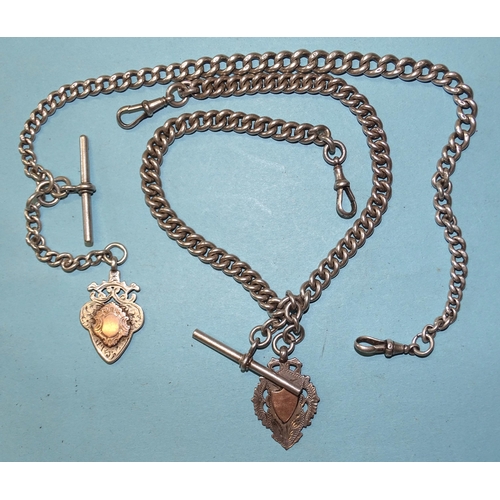 375 - A silver graduated curb-link watch chain and a silver curb-link Albert watch chain, (both with medal... 