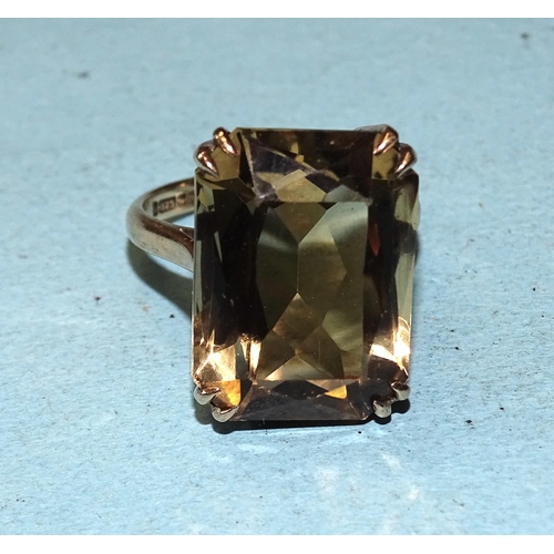 392 - A 9ct gold dress ring set a large scissor-cut citrine, 18 x 13mm, size L, 5.7g.