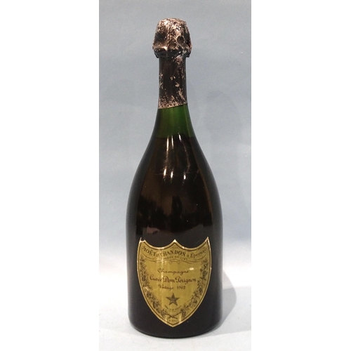 460 - Moët et Chandon Cuvée Dom Perignon, Vintage 1962, (label scuffed, one corner lacking, foil damaged),... 