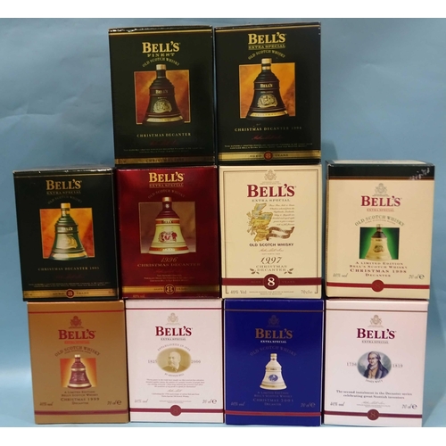 464 - A collection of Bells Christmas presentation whisky decanters, 40%, 70cl, 1988-1991 and 1993-2002, a... 