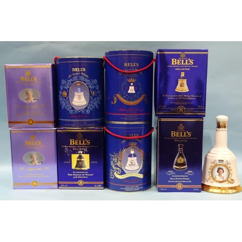 465 - A collection of Bells ceramic commemorative whisky decanters: Queen Elizabeth the Queen Mother Cente... 