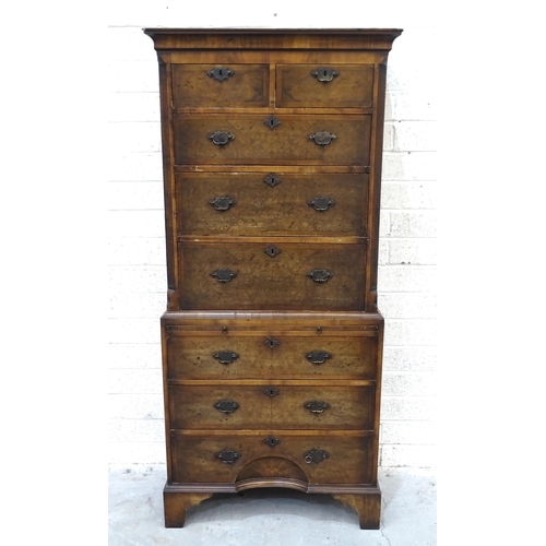 69 - A reconstructed and re-veneered partly-18th-century walnut crossbanded chest on chest, the cornice a... 