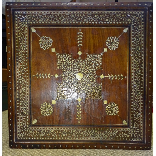 70 - An Anglo-Indian hardwood square folding table inlaid overall with ivory, ebony and bone, the base wi... 