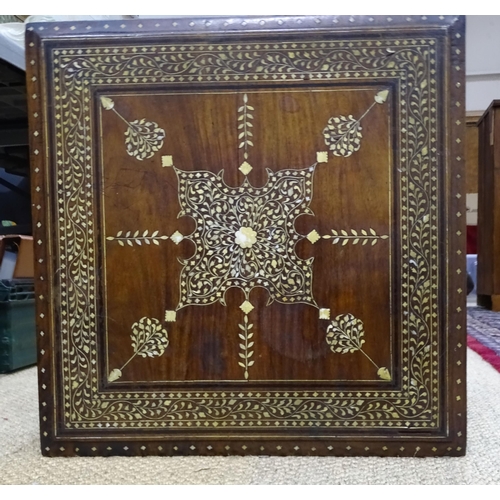 70 - An Anglo-Indian hardwood square folding table inlaid overall with ivory, ebony and bone, the base wi... 