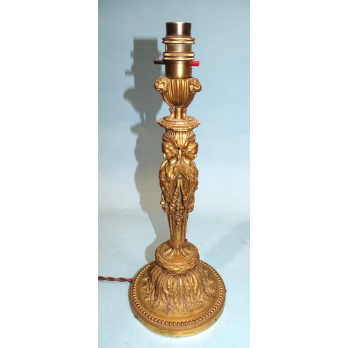 92 - An attractive ormolu table lamp in the form of three caryatids supporting a three-footed brazier, wi... 