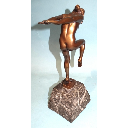 96 - A 1920's-style polished bronze nude female figure with arms stretched behind, raised on stone plinth... 