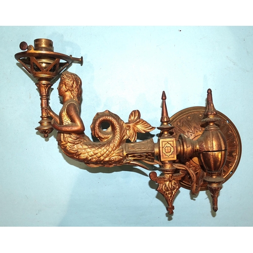 97 - Three gilt metal wall sconce light fittings, each in the form of a mermaid supporting a torch, exten... 