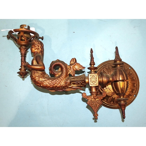 97 - Three gilt metal wall sconce light fittings, each in the form of a mermaid supporting a torch, exten... 