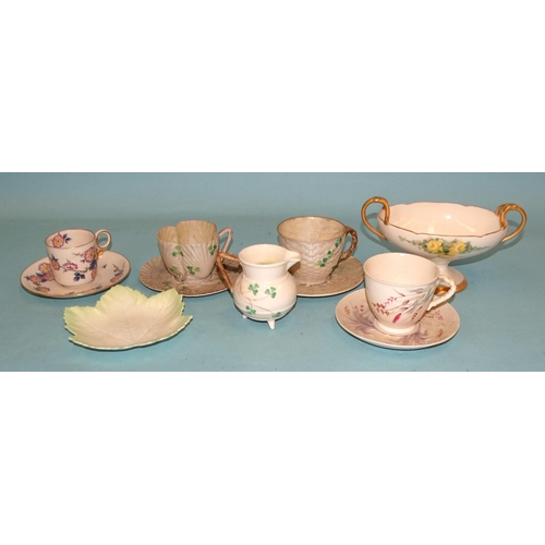 132 - A collection of Belleek shamrock pattern ceramics, together with printed and painted items, a collec... 