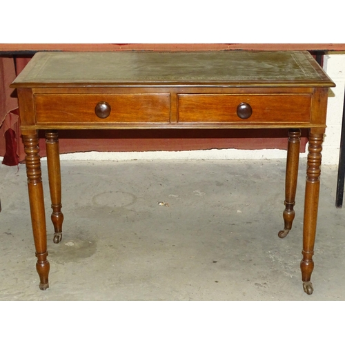 67 - A 19th century mahogany side table inset leather writing surface and two frieze drawers, on turned l... 