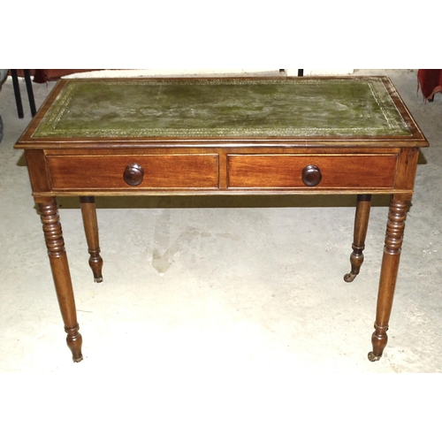 67 - A 19th century mahogany side table inset leather writing surface and two frieze drawers, on turned l... 