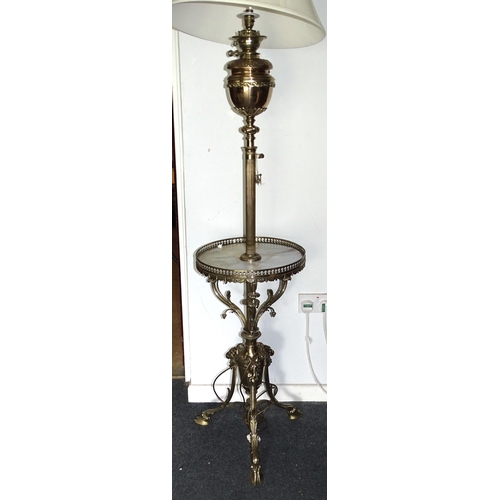 71 - An impressive antique brass adjustable oil lamp stand, the 