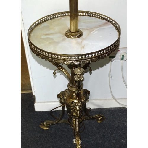 71 - An impressive antique brass adjustable oil lamp stand, the 