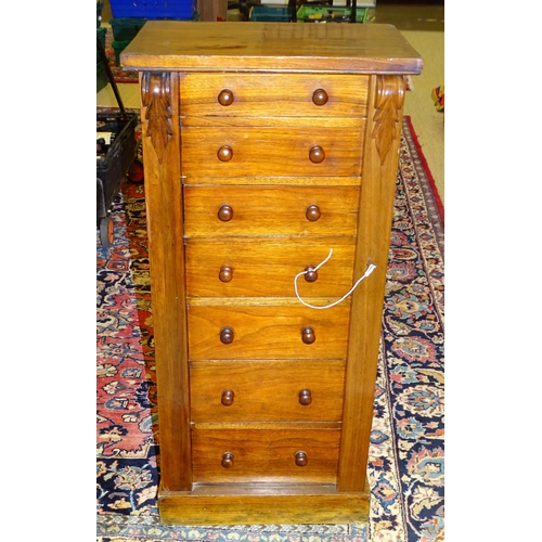 73 - A late-Victorian walnut Wellington chest fitted with seven drawers and locking bar, on plinth base, ... 