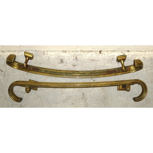 81 - A pair of large and heavy bronze door handles or banister rails, 85cm long, (2).