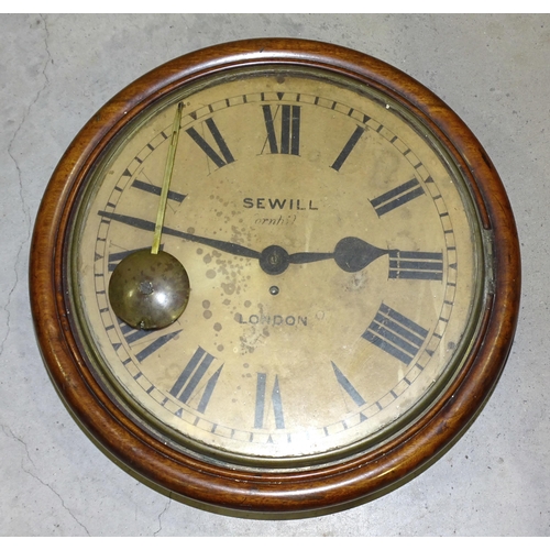 42 - A large Victorian circular wall clock, the circular discoloured white enamel dial marked Sewill, Cor... 