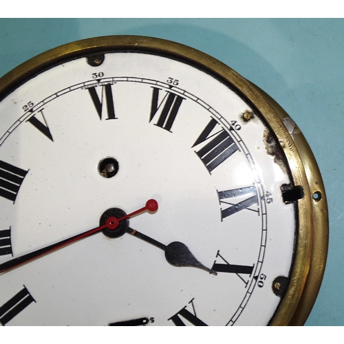 44 - A ship's brass circular bulkhead clock, with enamel dial and Roman numerals, (chip to enamel outer e... 