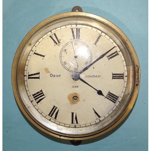 46 - A small brass circular ship's clock with enamel dial and seconds subsidiary, marked Dent, London 114... 