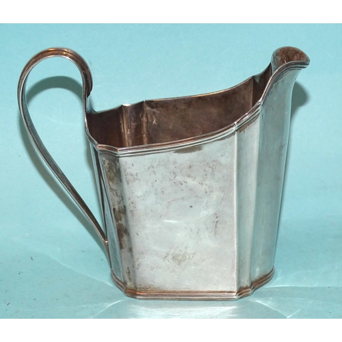 132 - A George III plain cream jug with reeded borders and C-scroll handle, 10cm high, London 1792, maker ... 