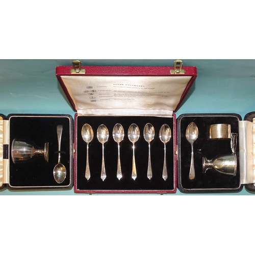 134 - A cased Viners silver christening set, comprising egg cup, spoon and napkin ring, Sheffield 1960, an... 