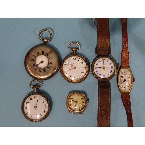 129 - A lady's 9ct gold cased wristwatch (one lug missing), gross wt 8.5g, a Continental 900 silver half h... 