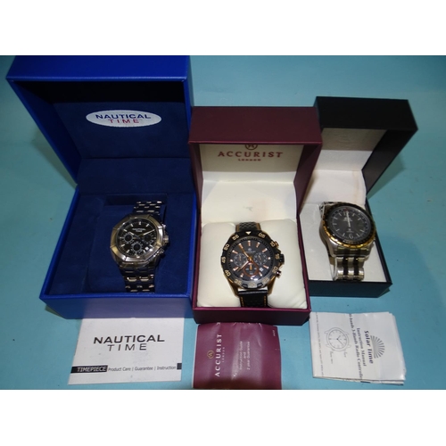 141 - Three modern  gents wristwatches: Accurist 50 Metres, Nautical Time and Solar Time, all boxed w... 