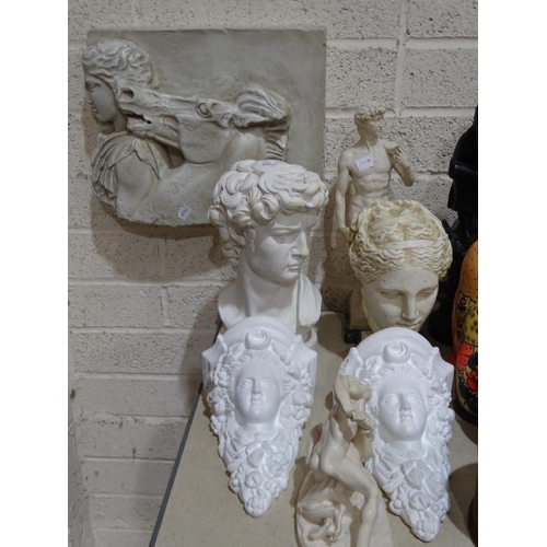 27 - A pair of plaster wall brackets, 25.5 x 15cm, (af), a plaster bust of a male, one other, a wall plaq... 