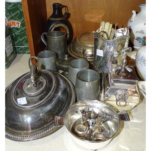 36 - A small collection of plated ware including two entrée dishes, a bottle stand, a pair of whit... 